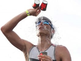 How Does Dehydration Affect Triathlon Performance? Pouring Water Over Head In Ironman